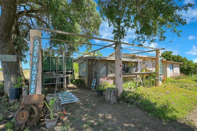 exterior space with an outbuilding