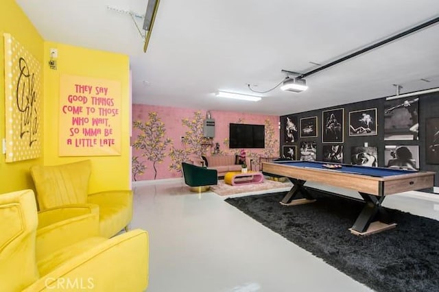 recreation room with concrete floors and pool table