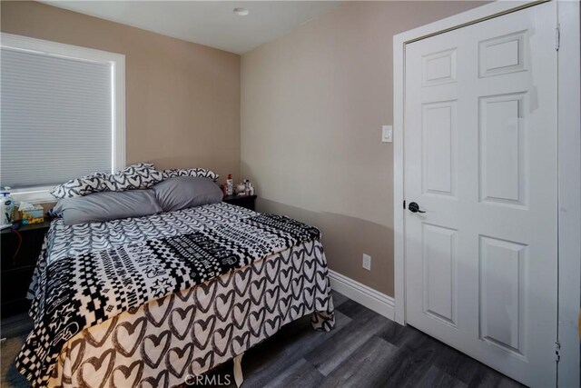 222 F St, Needles, CA 92363 - bedroom featuring dark wood finished floors and baseboards