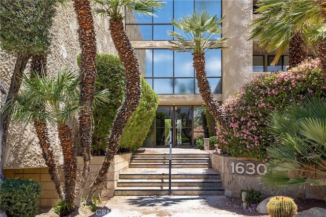 property entrance featuring french doors