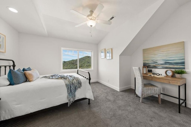 bedroom with ceiling fan, carpet, and lofted ceiling