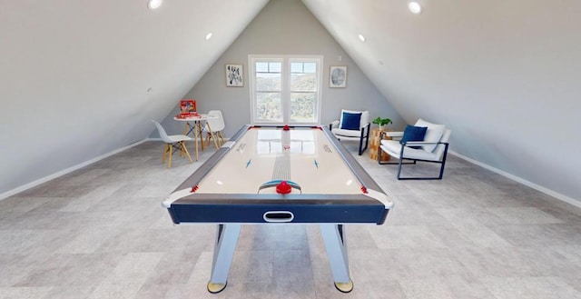 game room with vaulted ceiling