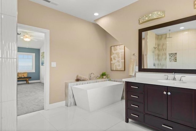 bathroom with ceiling fan, tile patterned floors, separate shower and tub, and vanity