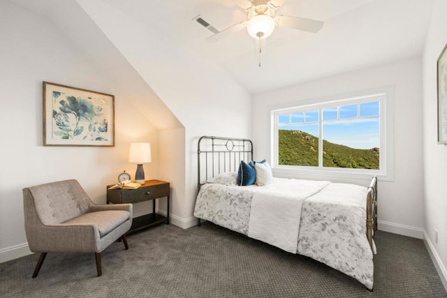 carpeted bedroom with ceiling fan and lofted ceiling