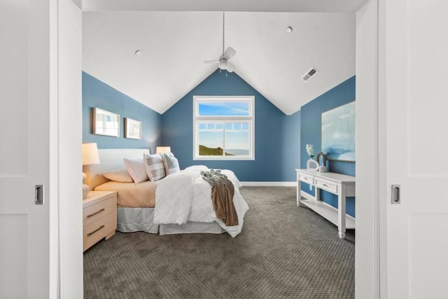 carpeted bedroom with vaulted ceiling