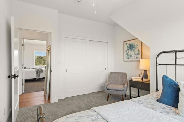 carpeted bedroom with a closet