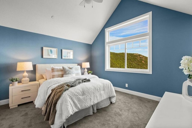 bedroom featuring ceiling fan, lofted ceiling, and carpet floors