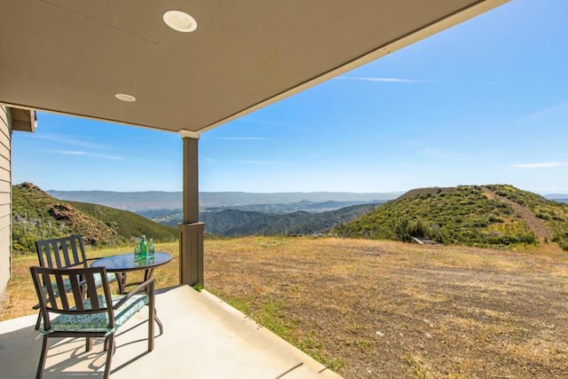 exterior space featuring a mountain view