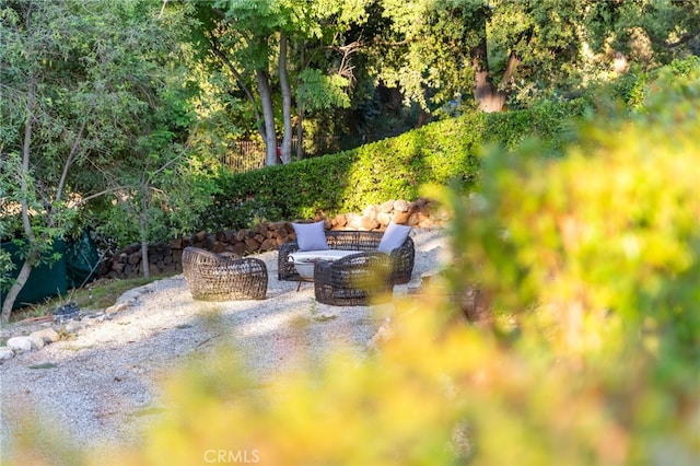 exterior space featuring a patio area and a fire pit