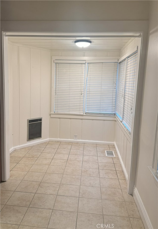 tiled empty room with heating unit