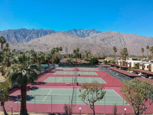 view of sport court with a mountain view