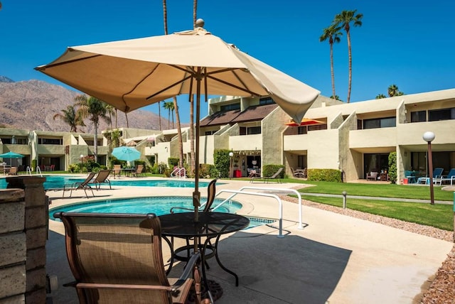 view of patio / terrace with a community pool