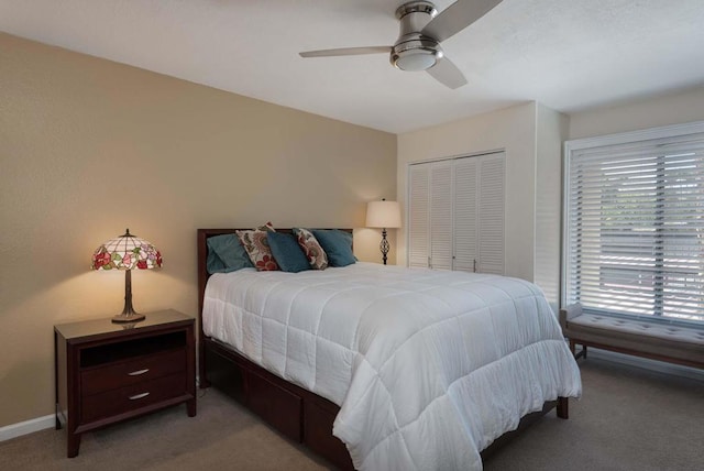 bedroom with a closet, ceiling fan, and carpet flooring