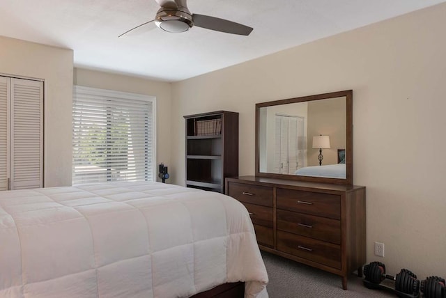 carpeted bedroom featuring a closet and ceiling fan