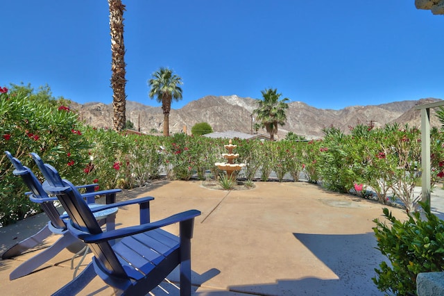 view of patio featuring a mountain view