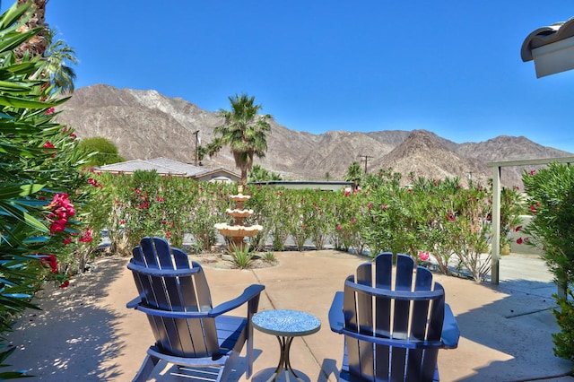 view of patio featuring a mountain view