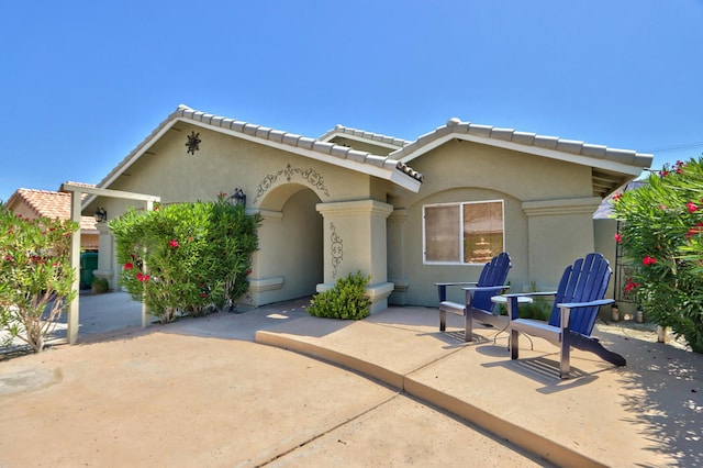 view of front of property with a patio area