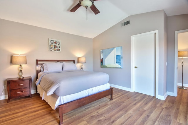 bedroom featuring wood-type flooring, ceiling fan, and lofted ceiling