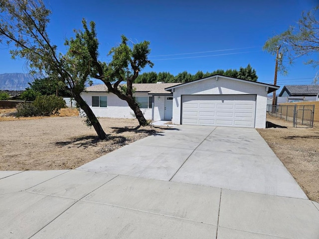 single story home with a garage