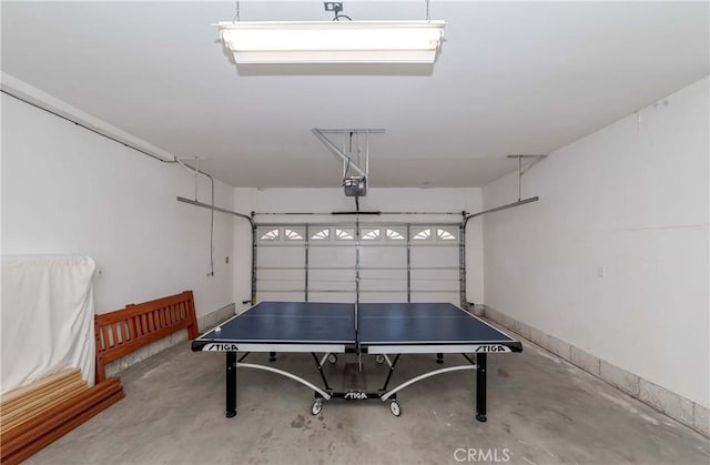 rec room with concrete flooring