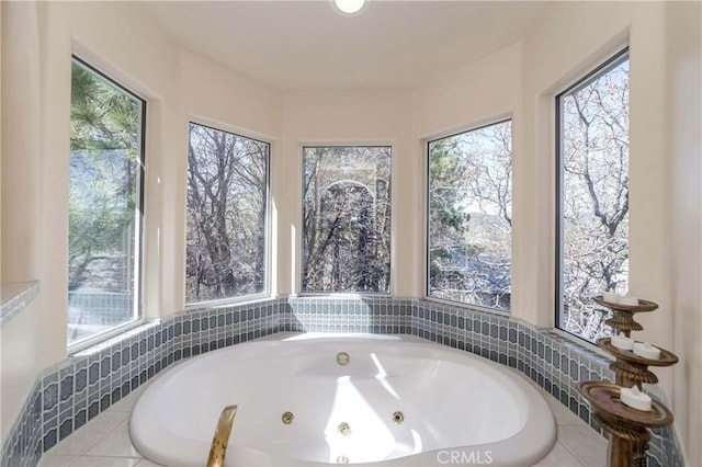 bathroom featuring tiled bath