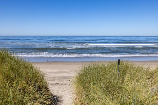 view of water feature with a view of the beach