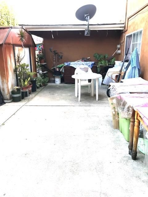 view of patio / terrace featuring a storage shed