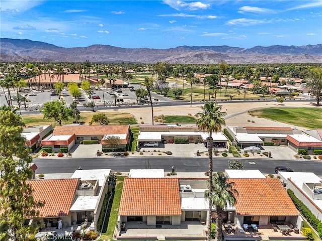 birds eye view of property featuring a mountain view