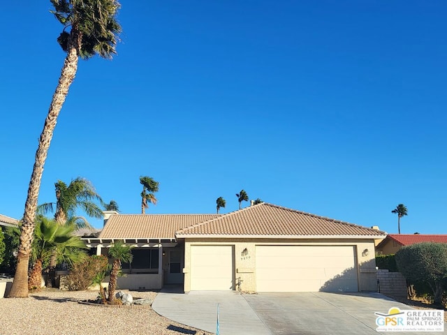 view of front of property with a garage