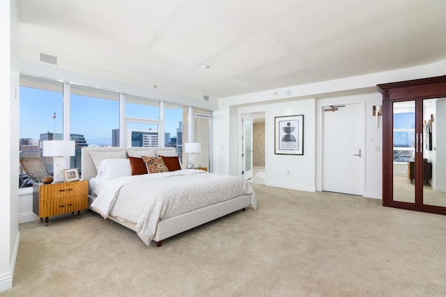 bedroom with carpet flooring and ensuite bath