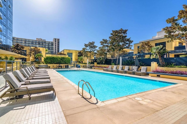 view of pool featuring a patio area