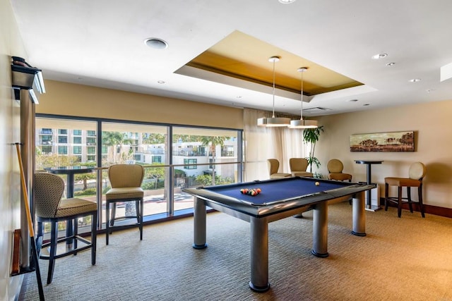 rec room featuring carpet flooring, a raised ceiling, and billiards