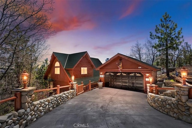 view of front of property with an outbuilding and a garage