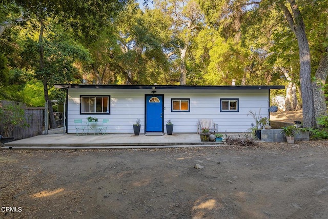 ranch-style house with a patio