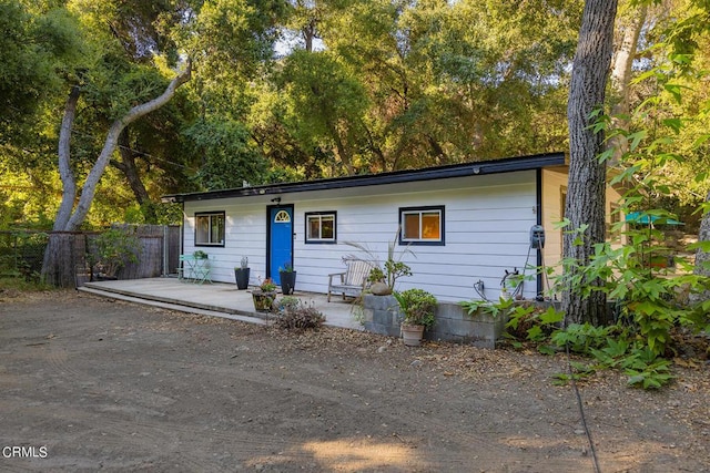 view of front of property featuring a patio area