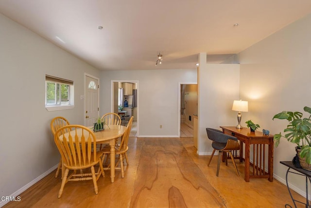 dining room with light wood-type flooring