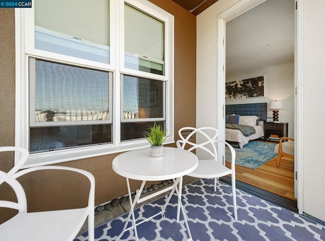 interior space with hardwood / wood-style flooring