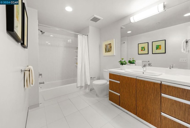 full bathroom featuring vanity, shower / bathtub combination with curtain, toilet, and tile flooring