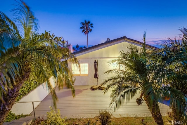 view of property exterior at dusk