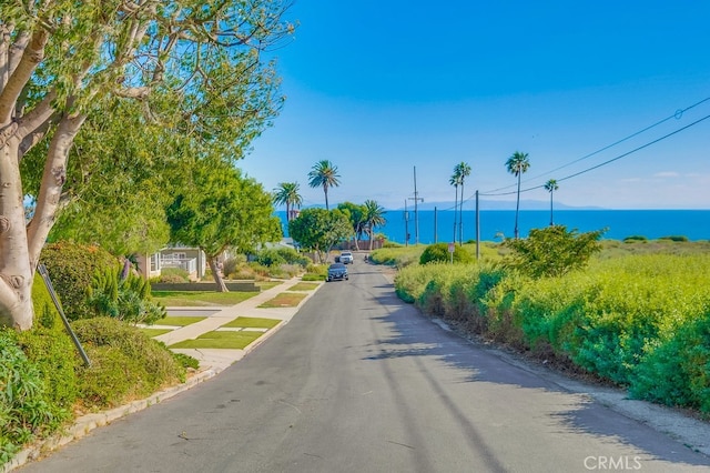 view of street featuring a water view