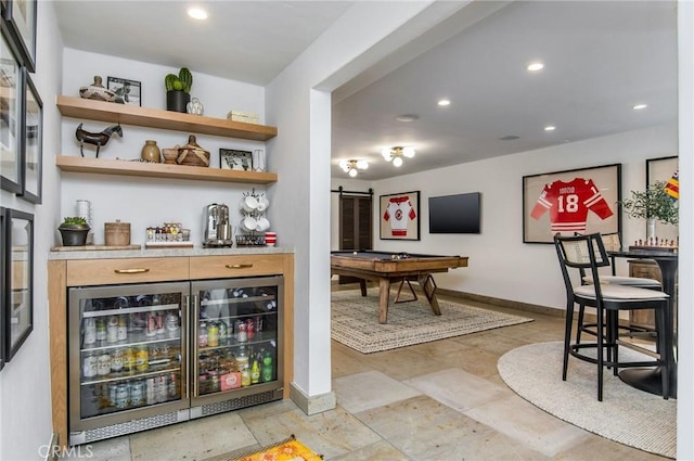 bar with a barn door, beverage cooler, and billiards