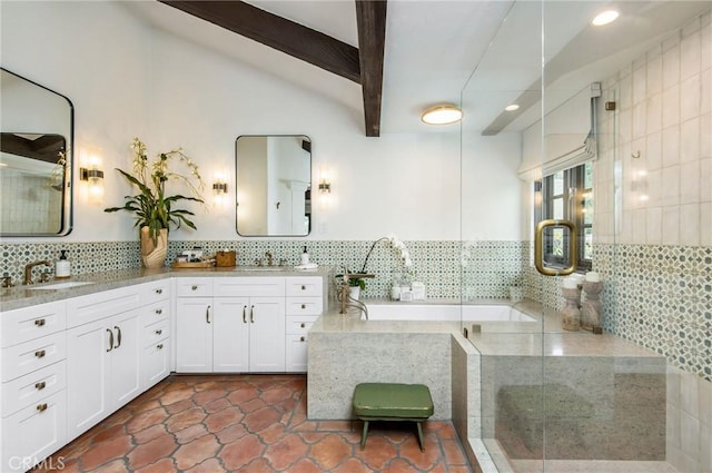 bathroom featuring vaulted ceiling with beams, walk in shower, vanity, and tasteful backsplash