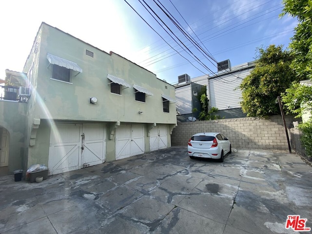 exterior space featuring a garage