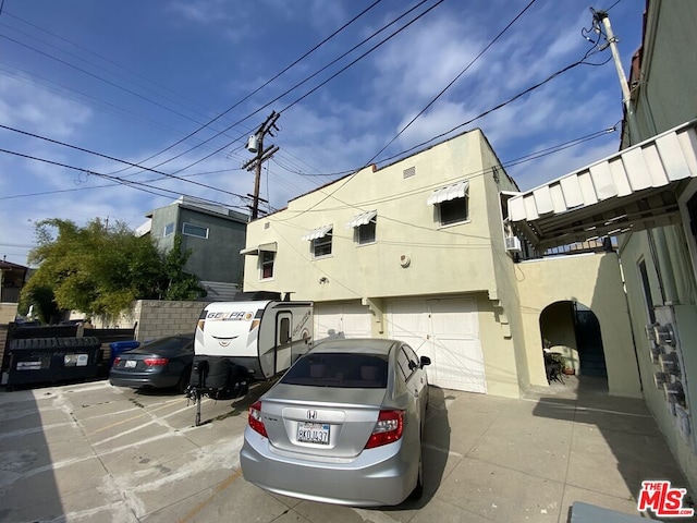 exterior space featuring a garage