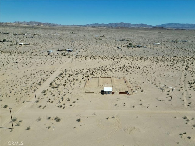 drone / aerial view featuring a mountain view