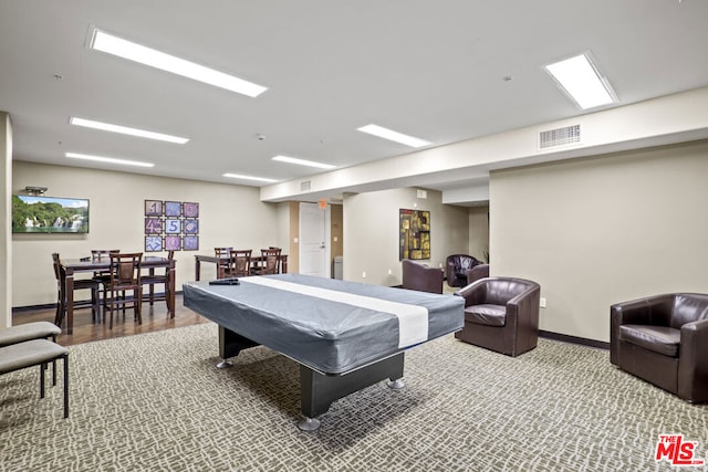 game room with wood-type flooring and pool table