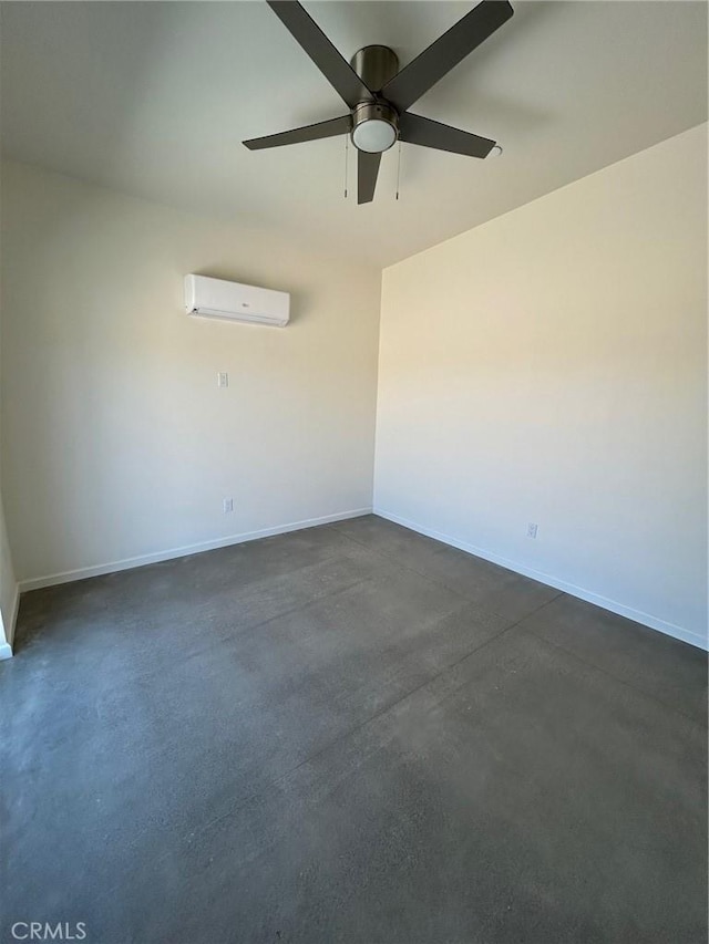 empty room featuring ceiling fan and a wall mounted AC