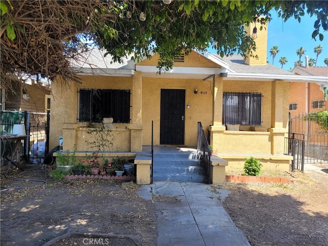 view of front of home featuring covered porch