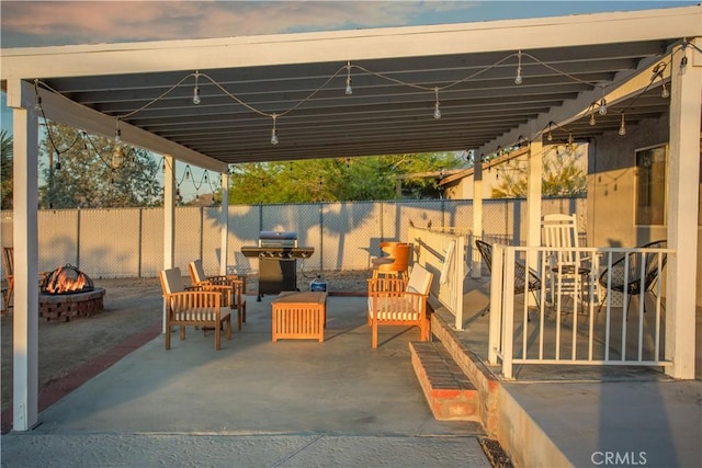 view of patio / terrace with a fire pit