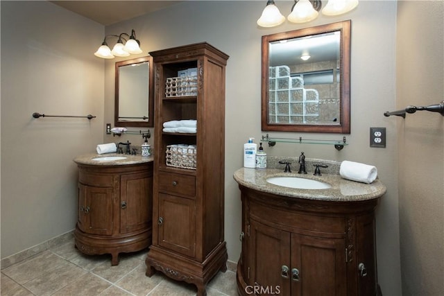 bathroom with vanity and tile patterned flooring